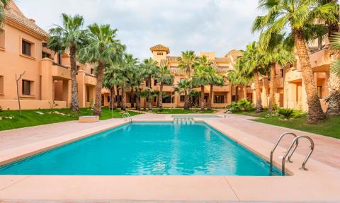 Duplex in a beach club on the first line of the sea